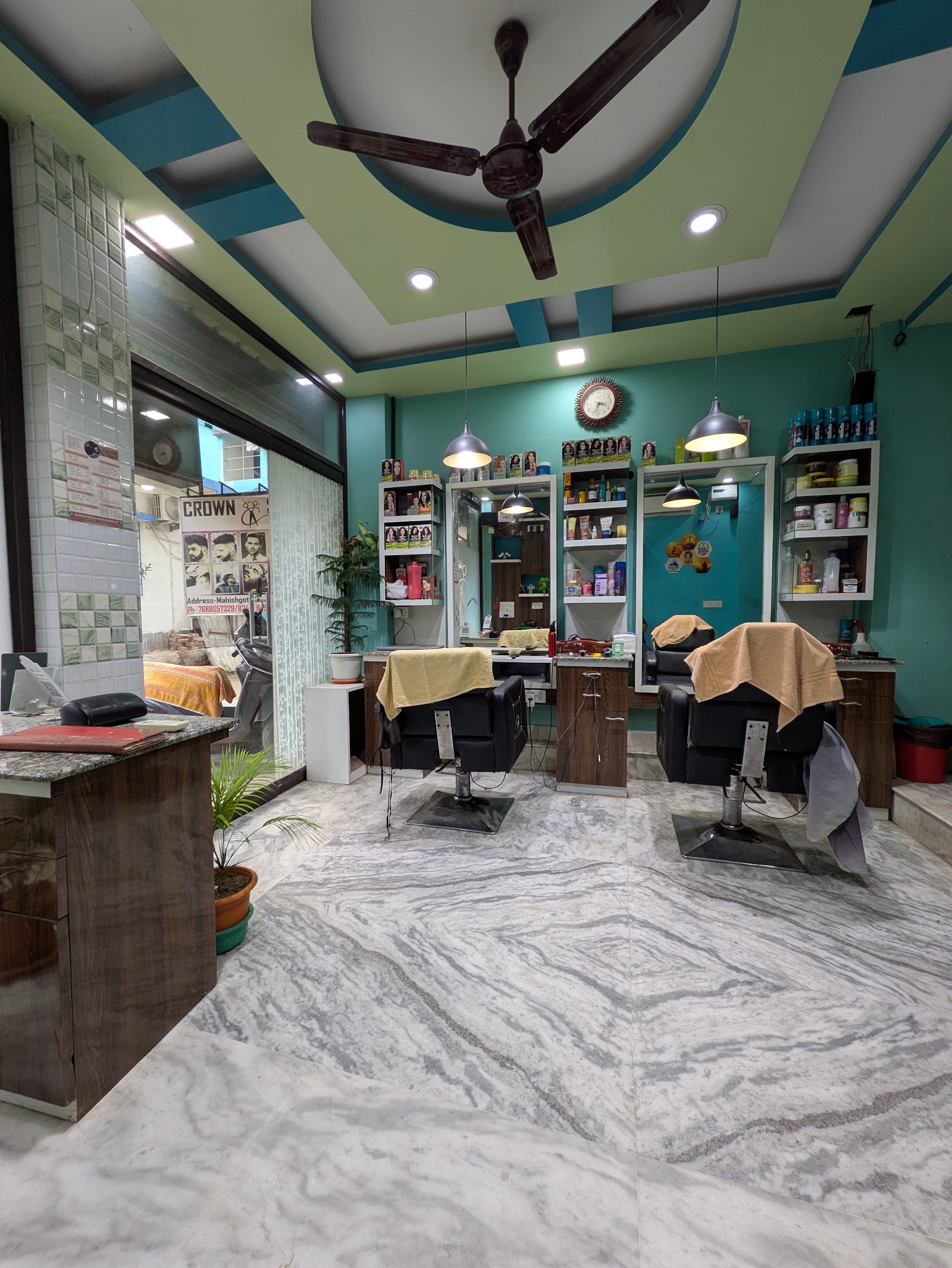 The salon floor — reception and styling chairs