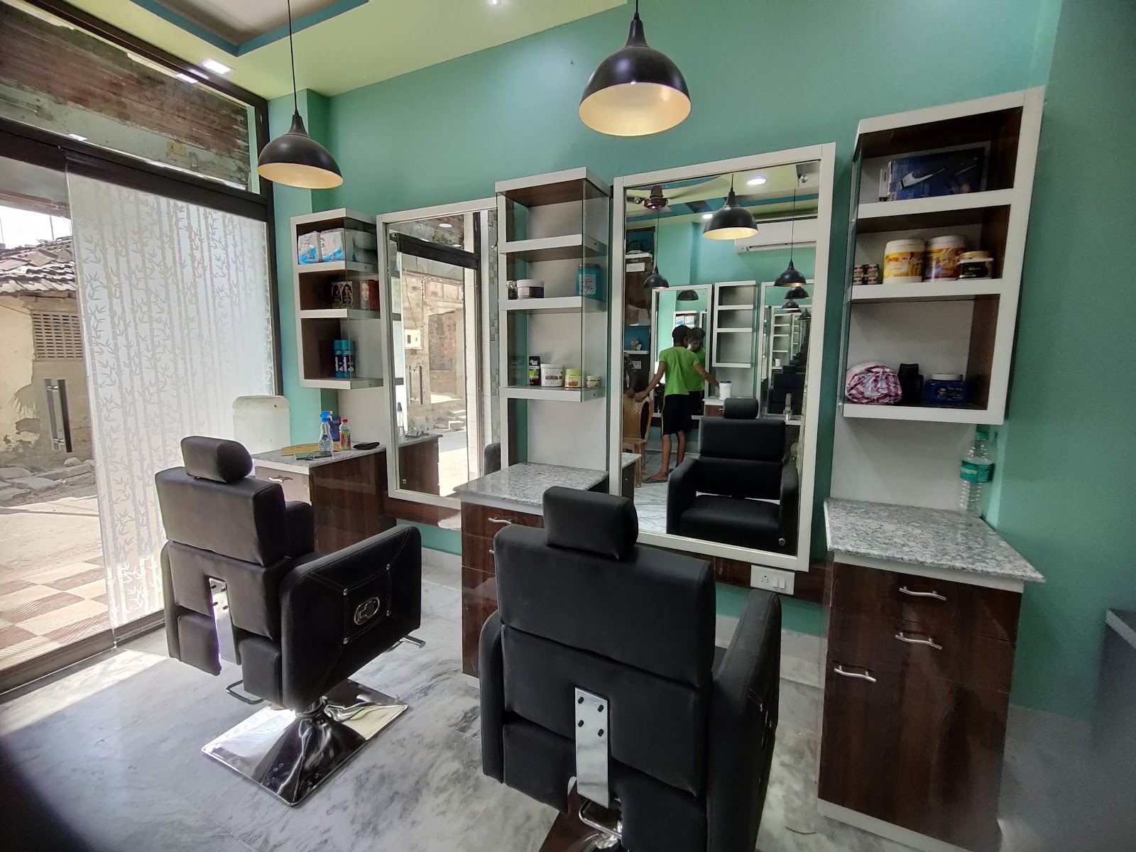 Styling stations with mirrors and chairs