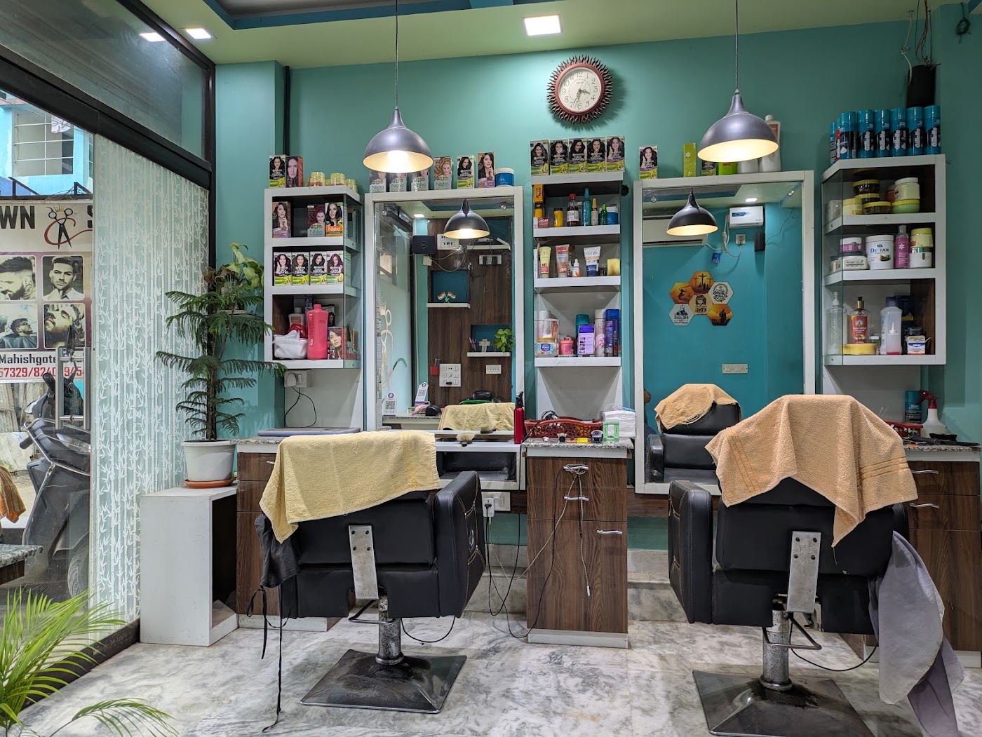 Styling stations inside Crown Saloon